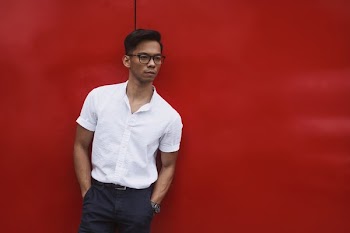 Red Wall Behind Men's Summer Fashion