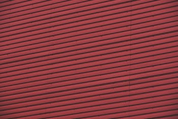 Red Wall Made Of Corrugated Steel