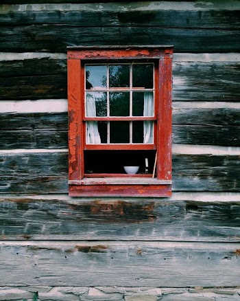 red wooden window frame