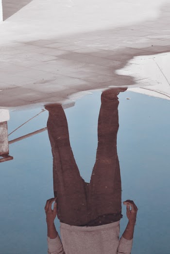 Reflection Of A Person Standing
