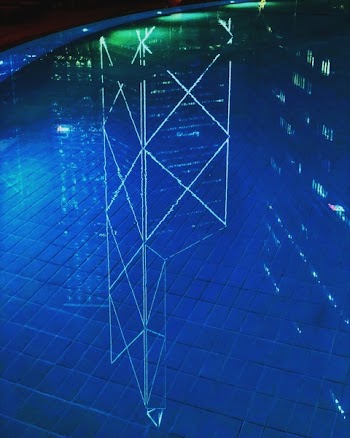 Reflection of Building on Swimming Pool