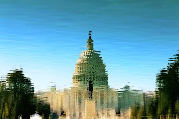 Reflection of Gray Mosque on Water