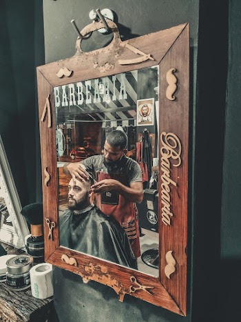 Reflection Of Men On Mirror