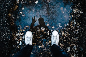 Reflection of Person Standing on Water