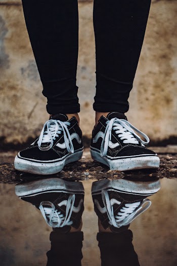 Reflection of Vans Sneakers on Water