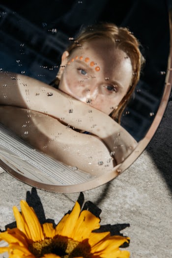 Reflection Of Woman 