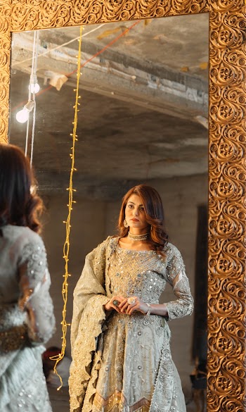 Reflection Of Woman In A Mirror