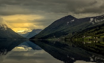 Reflection Photography of Mountain and Sky during Golden Hour