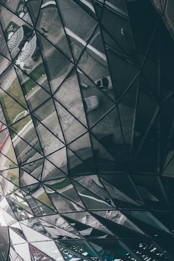 Reflections On A Glass Building