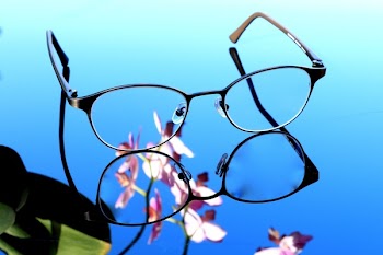 Reflective Photography of Black Framed Eyeglasses