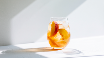 Refreshing Peach Iced Tea in Minimalist Setting