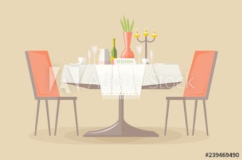 Reserved restaurant or cafe table with tablecloth, candles in candlestick, plant, wineglasses, reservation tabletop sign on it and two chairs