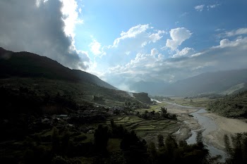 Rice Terraces Under White Clouds and Blue Sky