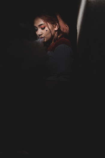 Rim Light Photo of Smoking Woman