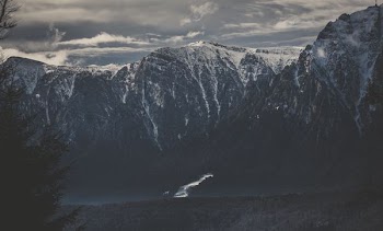 river beside mountains