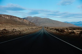 road in the desert during daytime