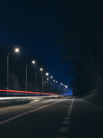 Road Near Post Lamp at Night Time