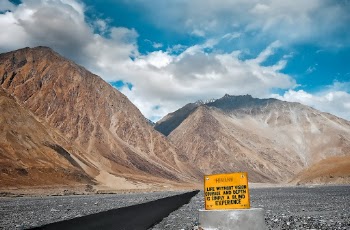 Road sign.
Add depth to your life —
Aim high, but
venerate the basics.