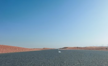 Road Surrounded By Sand