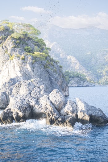 Rock Formation Near Body of Water