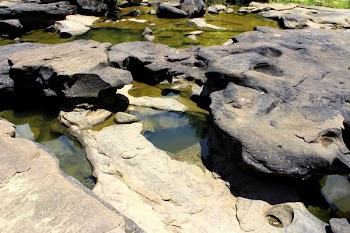Rock Formation Near Body of Water