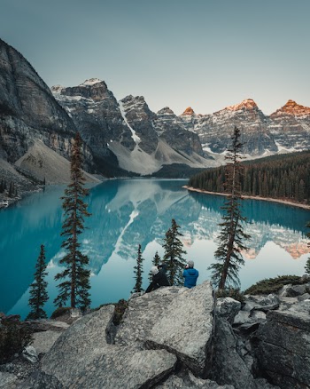 Rock Formation Near Calm Body of Water