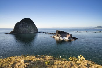 Rock Formation on Body of Water