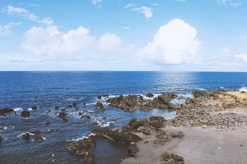 Rock Formation on Body of Water