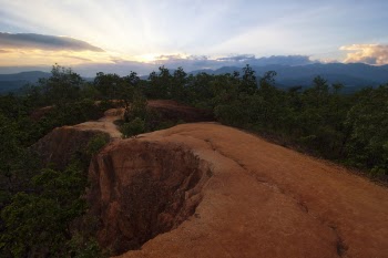Rock Formation Pathway Between Trees Under Crepuscular Wallpaper