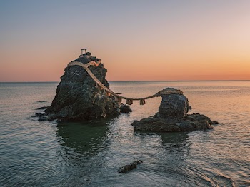 Rock Formations On A Body Of Water