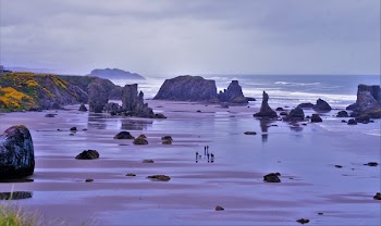 Rock Monolith on Body of Water