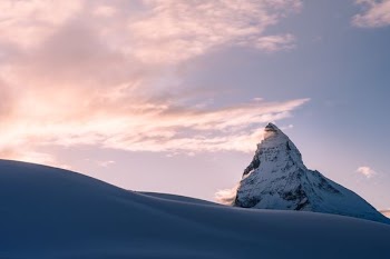 rock mountain cover by snow