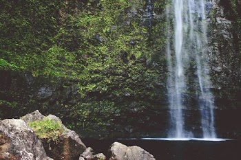 rock near waterfall