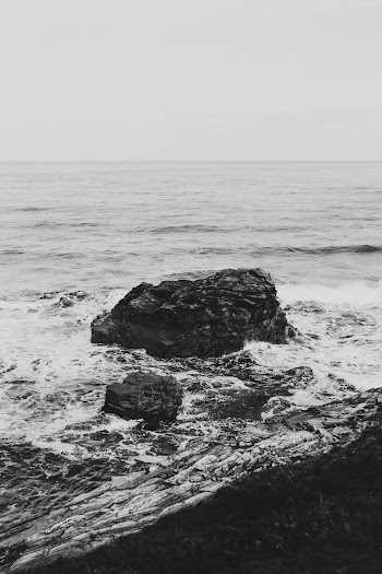 Rock on Body of Water