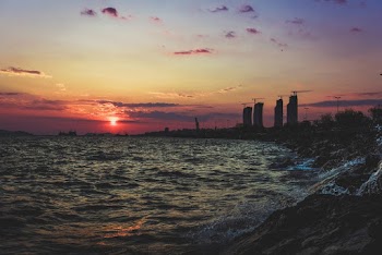 Rocks Beside Ocean during Golden Hour