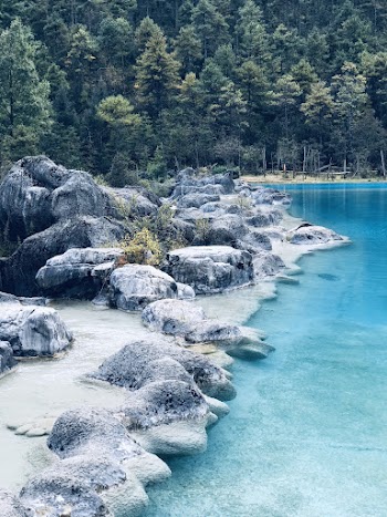 Rocks Beside Water Body