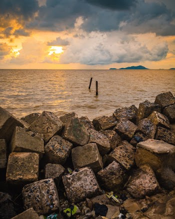 Rocks Near Body Of Water 