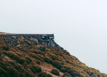 rocky hill during daytime
