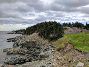 Rocky Lakeshore Clouded Sky