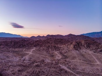 rocky mountain under dusk sky