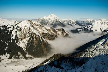 Rocky Mountain With Fog in Daytime Photo