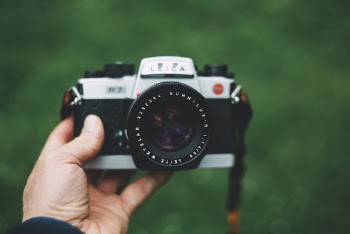 Round Black Analog Camera With Black Strap