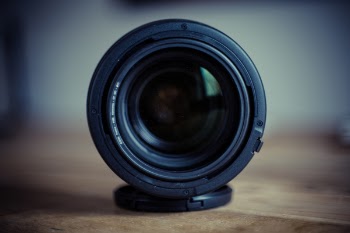 Round Black Zoom Lens on Table