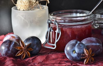 Round Fruit Near Mason Glass Jar