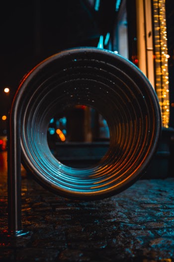 Round Gray and Black Metal Frame during Night Time