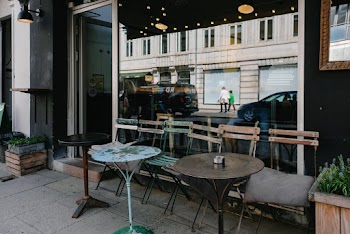 Round Gray Steel Table Near Caffe