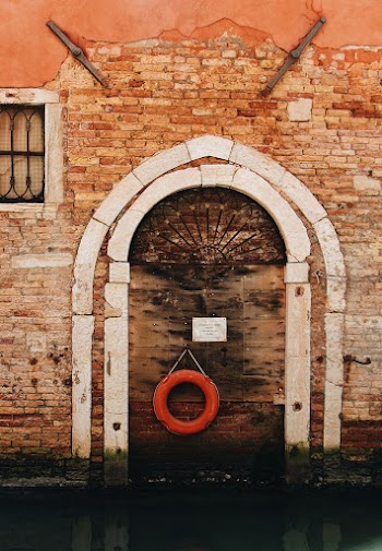 Round Inflatable Swim Ring Hanging On The Wall