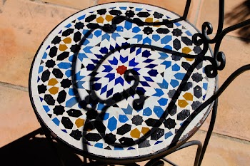 Round Multicolored Black Metal Framed Chair