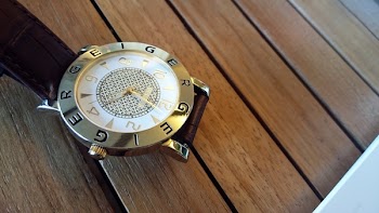 Round Silver-colored Analog Watch at 4:02