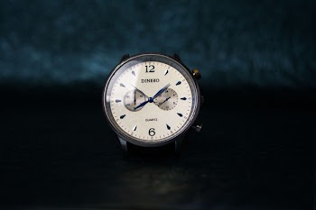 Round Silver-colored and White Chronograph Watch